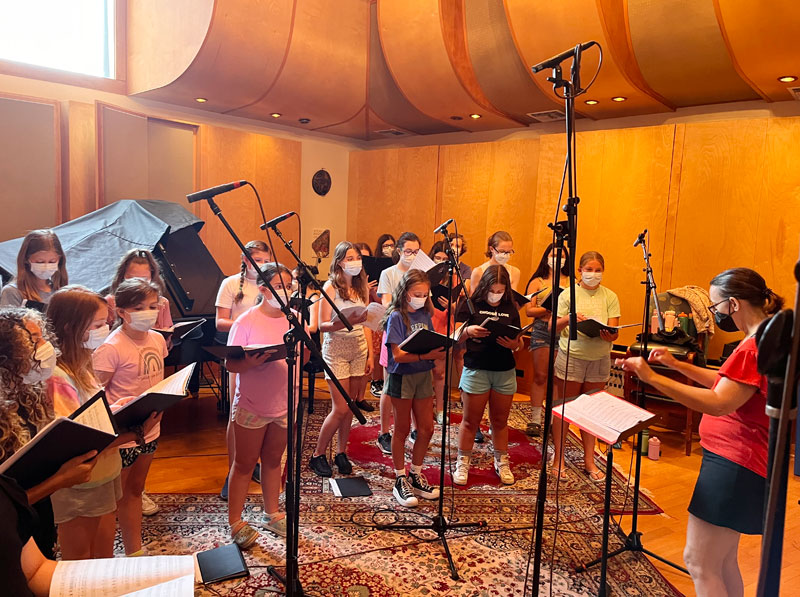 Group of young girls singing in GCR Audio recording studios